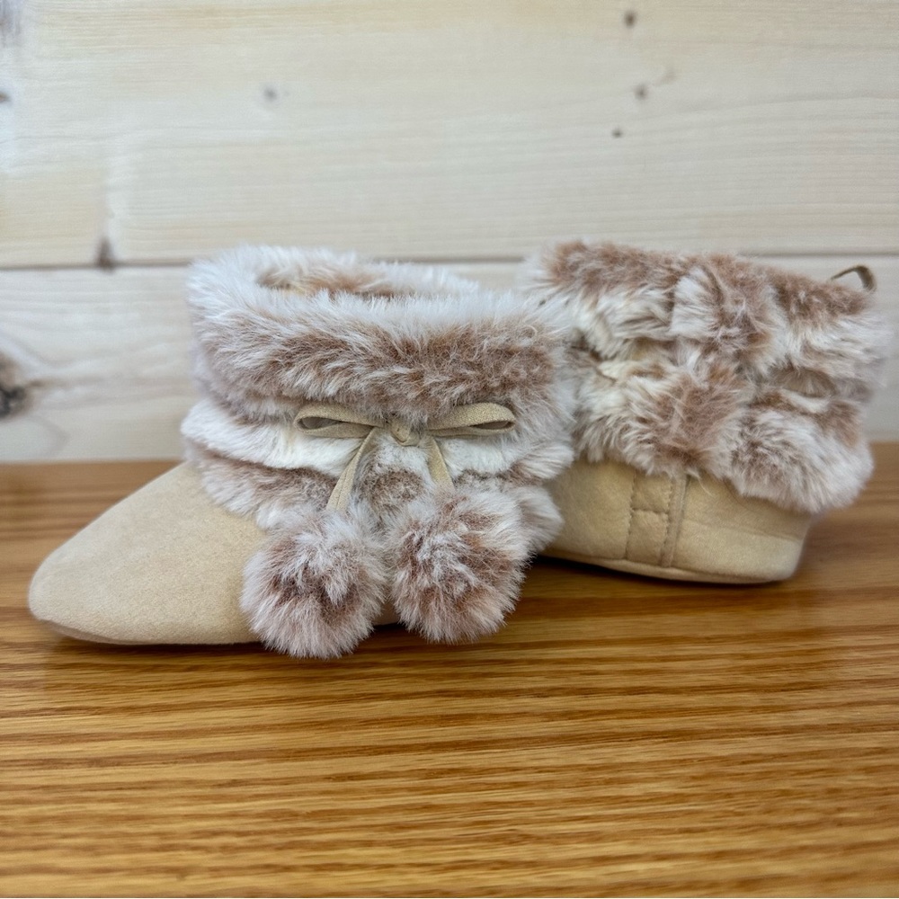 Stepping stones | fuzzy baby booties. Crib shoes with pompoms